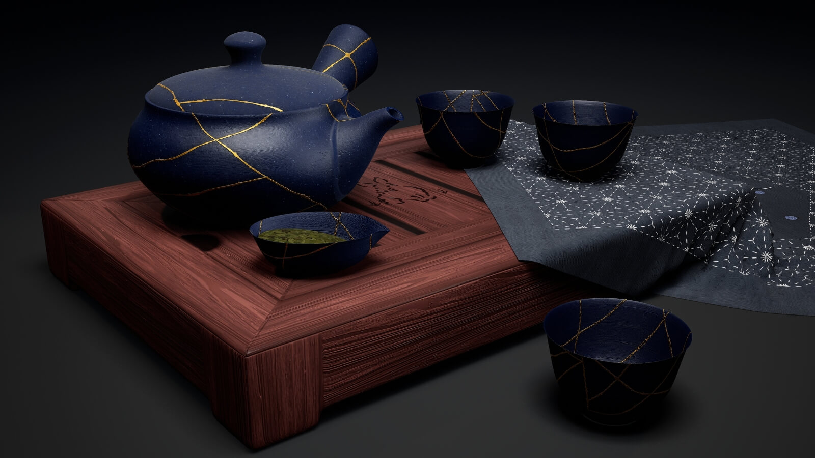 A side view of a blue and gold pottery set.
