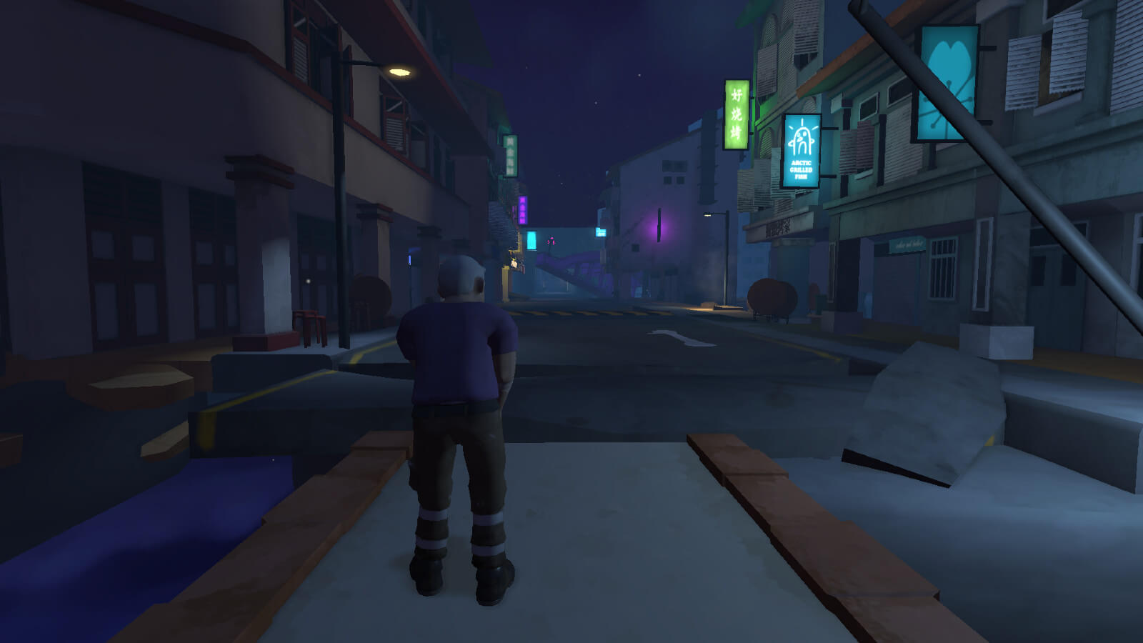Man standing while looking up at dark empty street