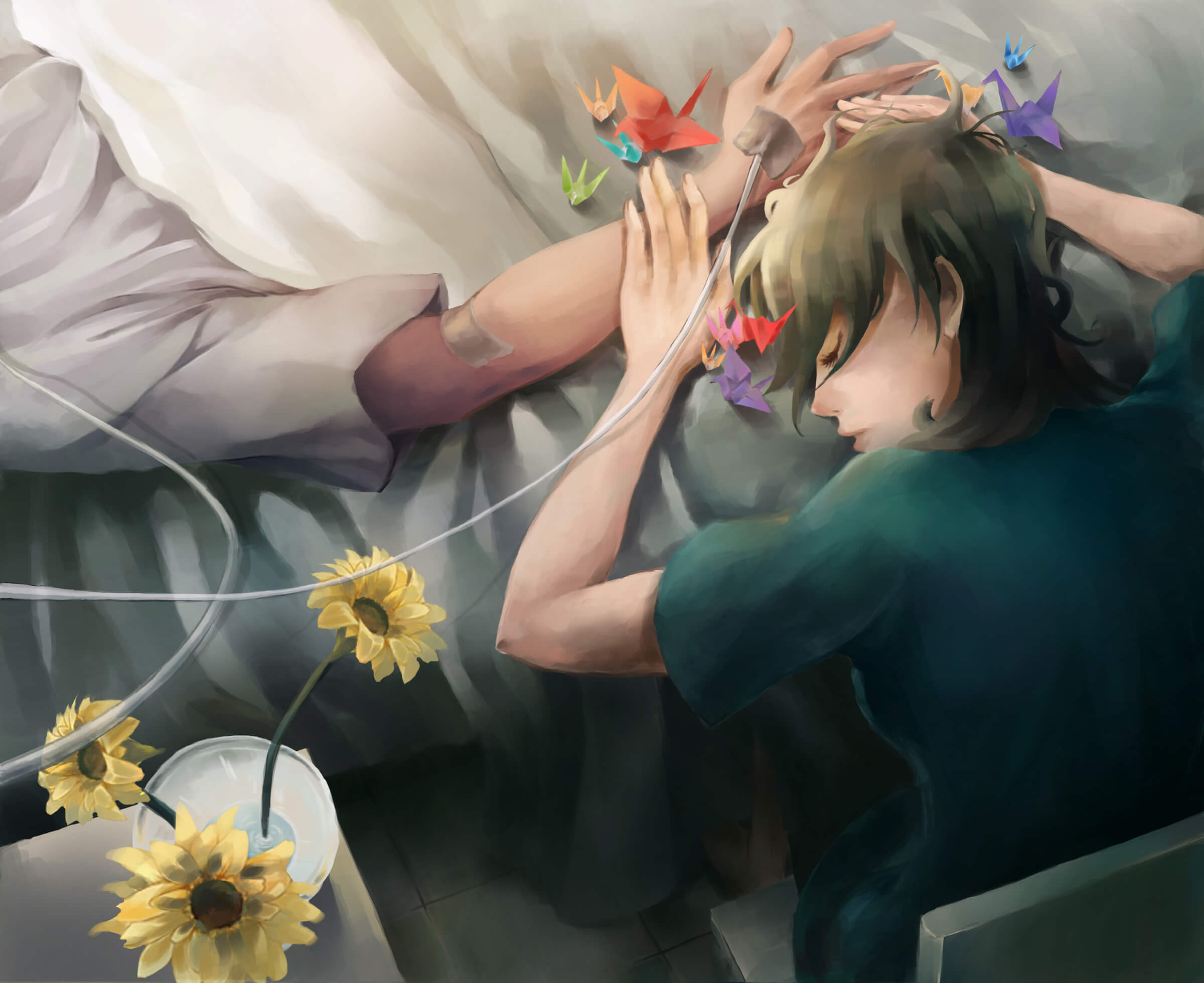 A girl rests her head against an arm of a person in a hospital bed, with several brightly colored paper cranes nearby.