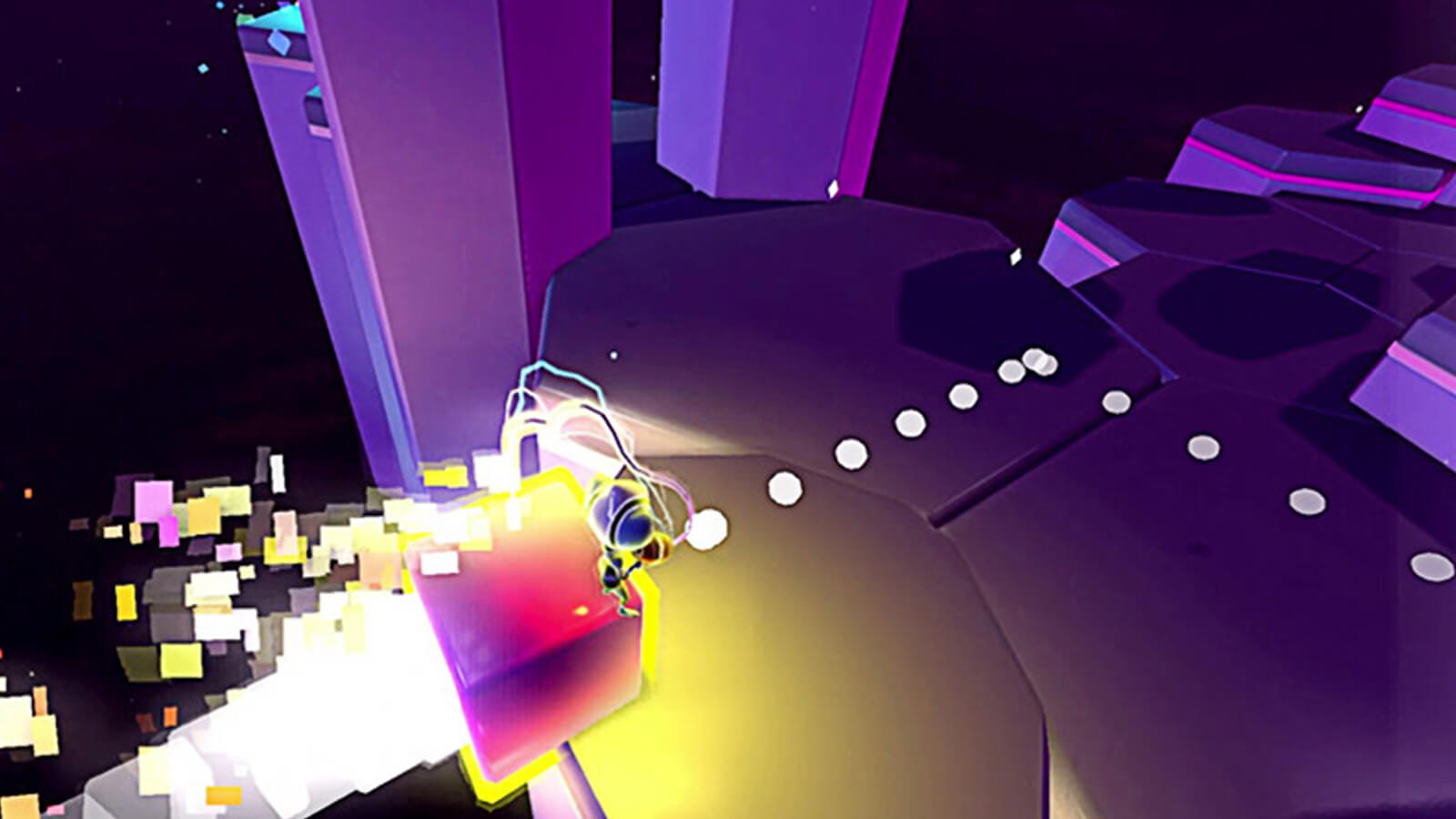The player's character is propelled forward on a block as white spheres appear in front of it