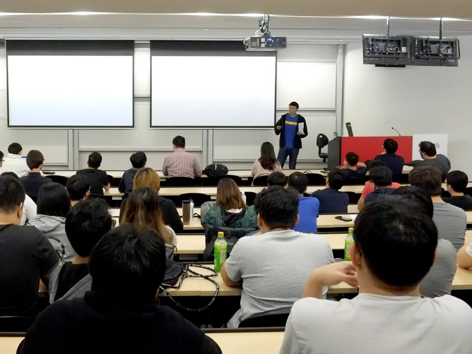 DigiPen (Singapore) BS in RTIS alumnus Tan Yao Wei speaks in front of a class