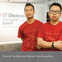 Terence Chow Shang Zhen and Tan Rijian pose in the ST Electronics lobby