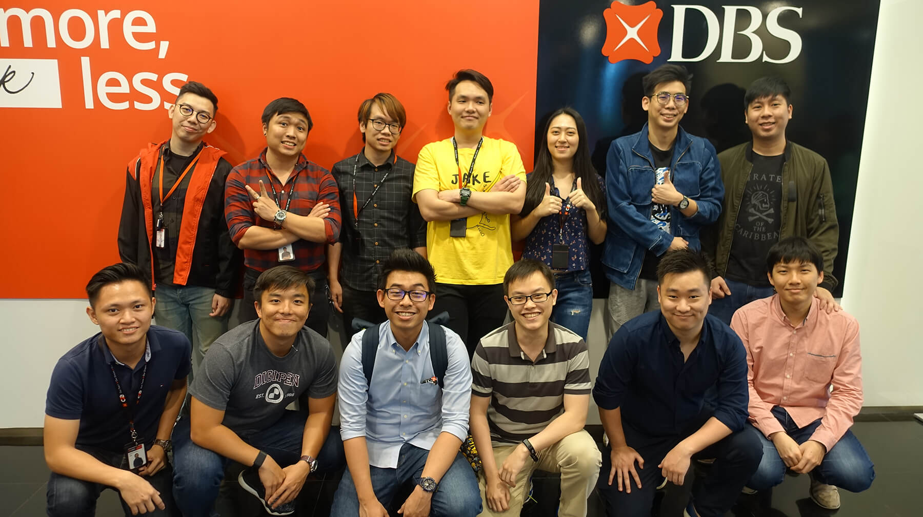 Group photo of 13 DigiPen (Singapore) graduates at DBS Bank